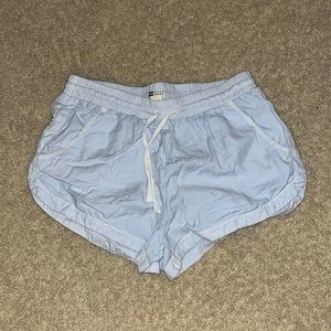 BillaBong light blue shorts. Size medium. Tie waist.